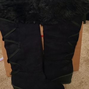 New black knee boots by Decree